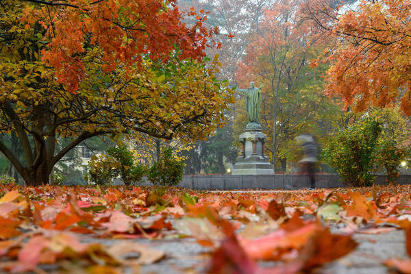 Sacred Heart of Jesus statue in fall