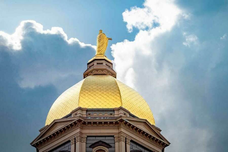 The Golden Dome against a backdrop of clouds